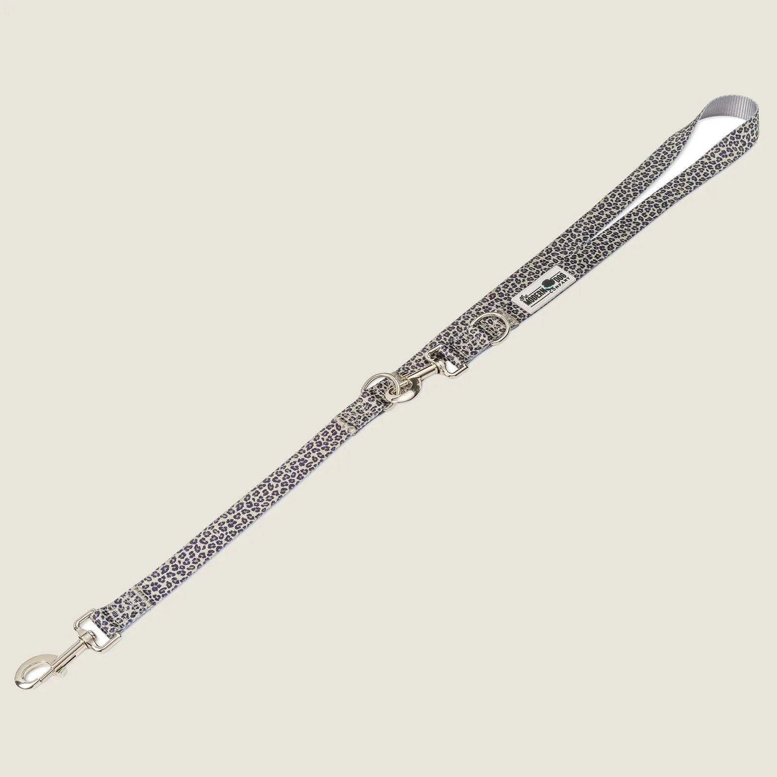 Leash featuring a stylish leopard-pattern design with dual swivel bolt snaps for adjustable lengths.