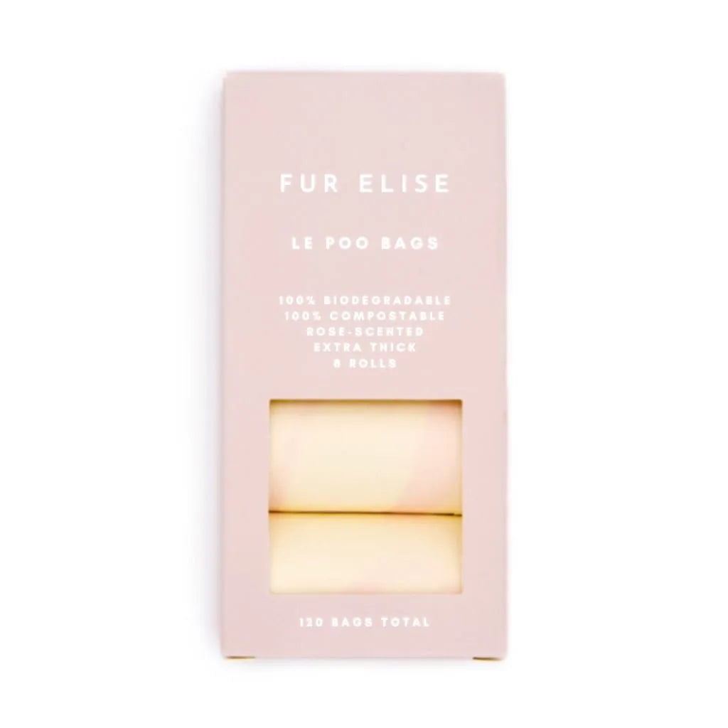 Biodegradable, rose-scented dog poo bags in a pale pink package, featuring eight rolls and eco-friendly messaging.