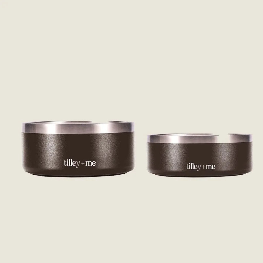 Stainless steel pet bowls in burnt umber brown, featuring a non-slip base and modern design, available in two sizes.