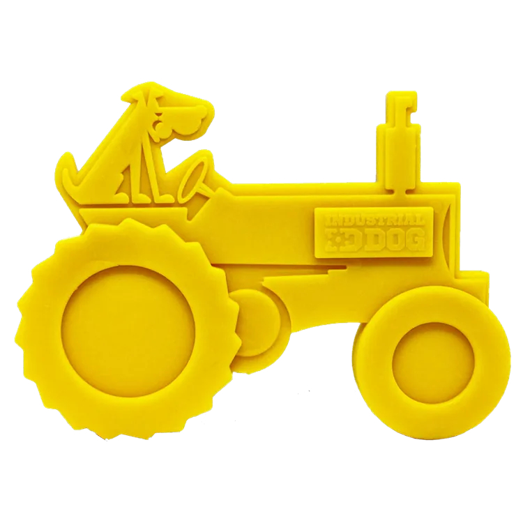Bright yellow tractor-shaped nylon dog toy featuring a textured surface, designed for aggressive chewers and dental health.