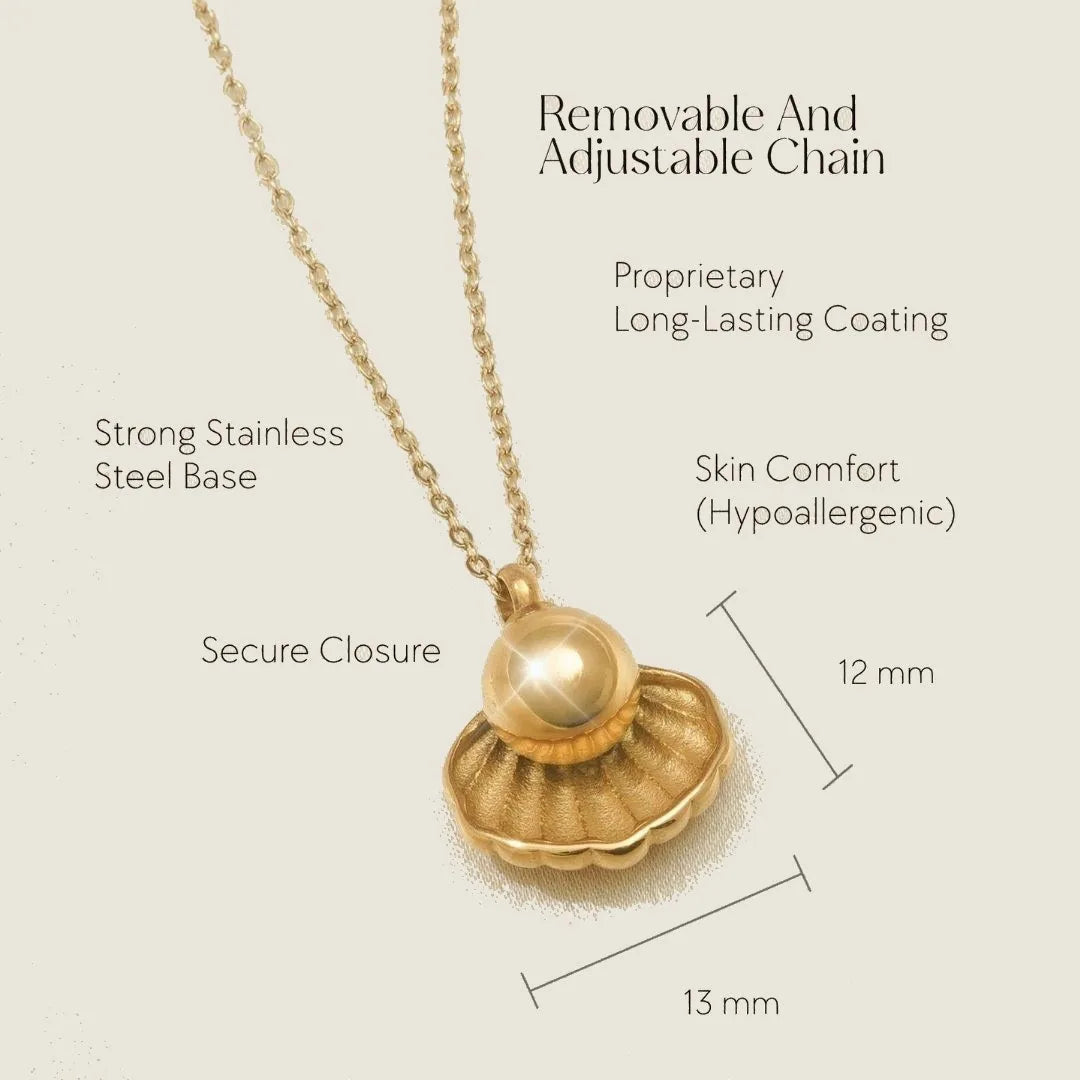 Gold cremation necklace with a shell design and pearl, featuring a stainless steel chain for holding pet ashes.