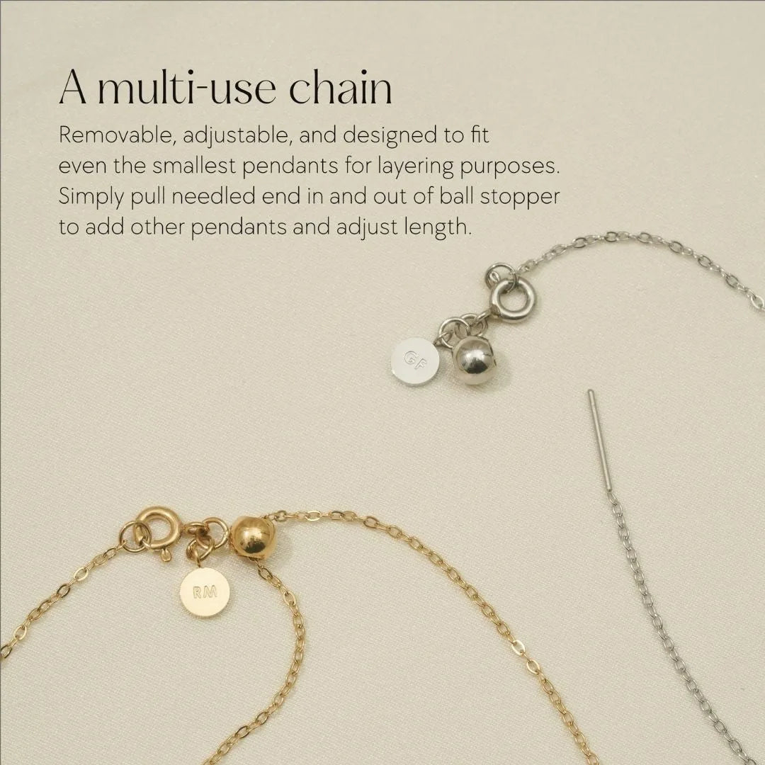 Adjustable multi-use necklace chain featuring gold and silver links, designed for layering with pendants.