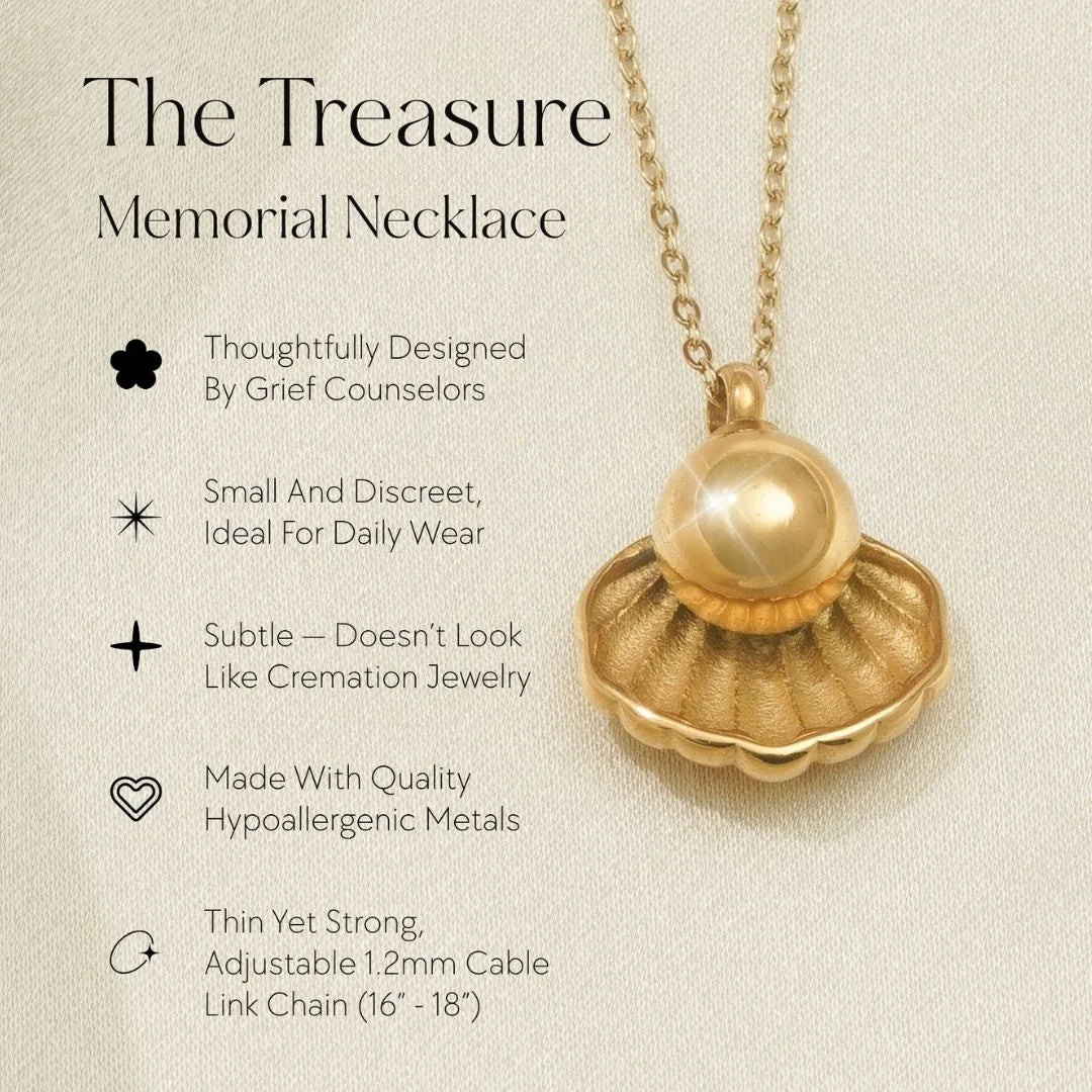 Gold memorial necklace featuring a shell-shaped pendant designed to hold ashes, set on a delicate cable link chain.