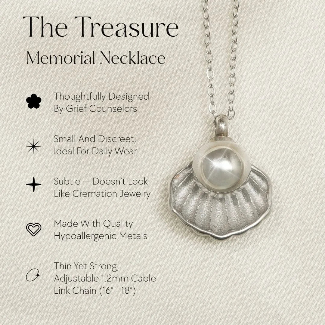 Silver shell-shaped memorial necklace with a pearl, on a thin adjustable chain, designed for daily wear.