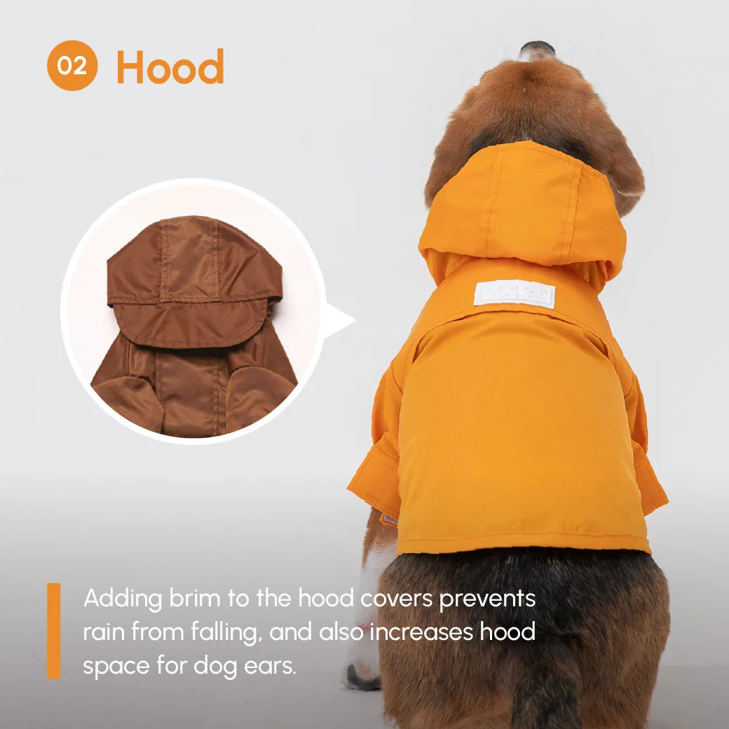 Adjustable egg yolk raincoat for dogs, featuring a roomy hood and velcro closures for a snug fit and easy wear.