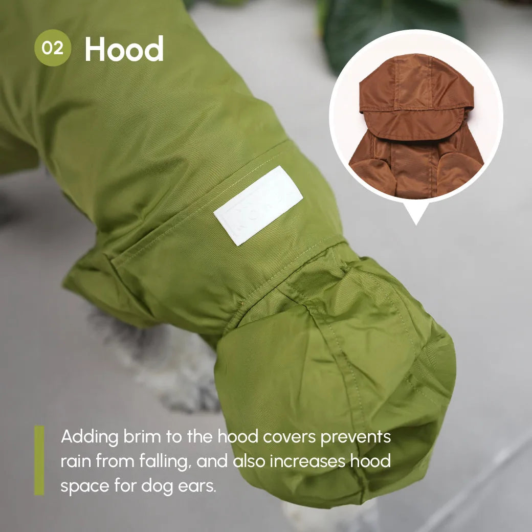 Olive green adjustable raincoat hood with brim and ear space, featuring velcro closures for easy wear.