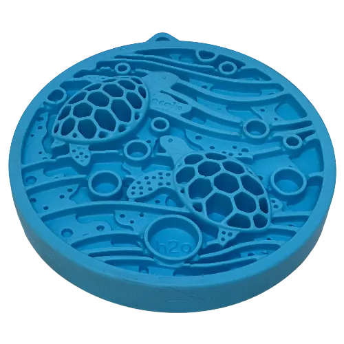 Turtle-shaped blue lick mat with varied textures, designed for small dogs and cats, featuring strong suction cups.