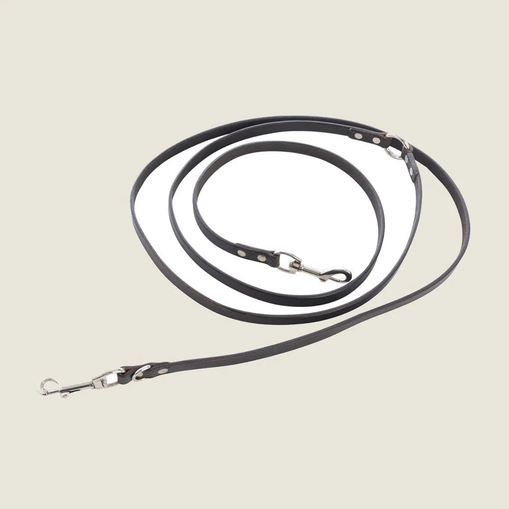 Sleek ebony leather dog leash with iron hardware, measuring 103 inches for stylish and functional walks.