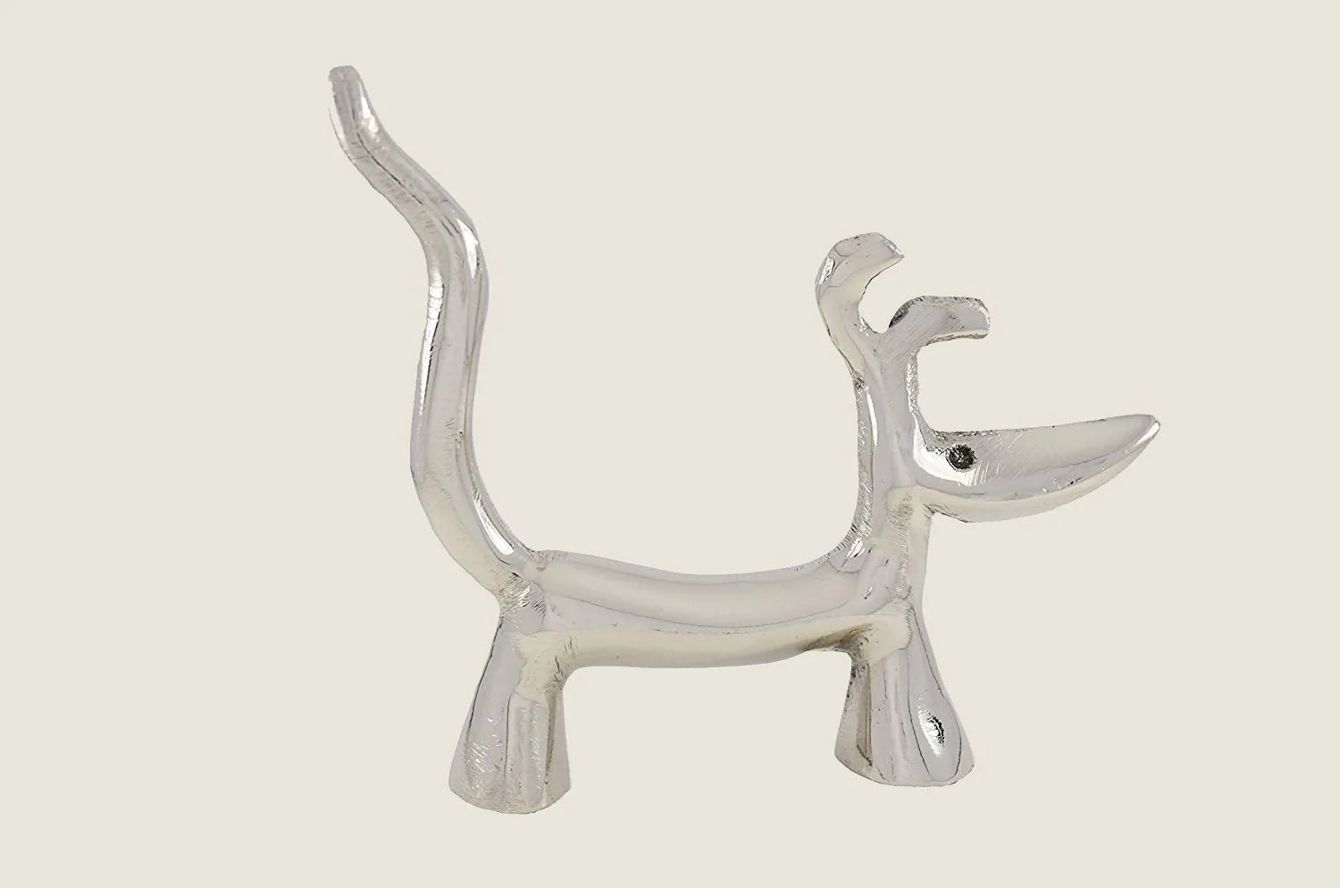 Handmade silver dog-shaped ring holder with a sleek design and sturdy base, ideal for organizing jewelry.