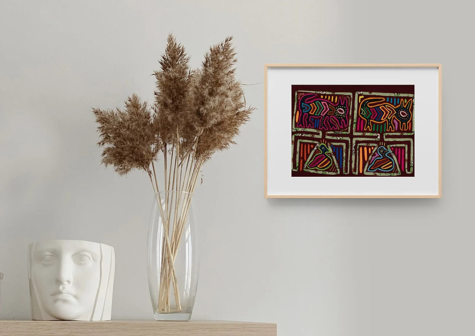 Colorful vintage bird and puppy dog design on a dark background, hand-stitched Panama Mola textile art.