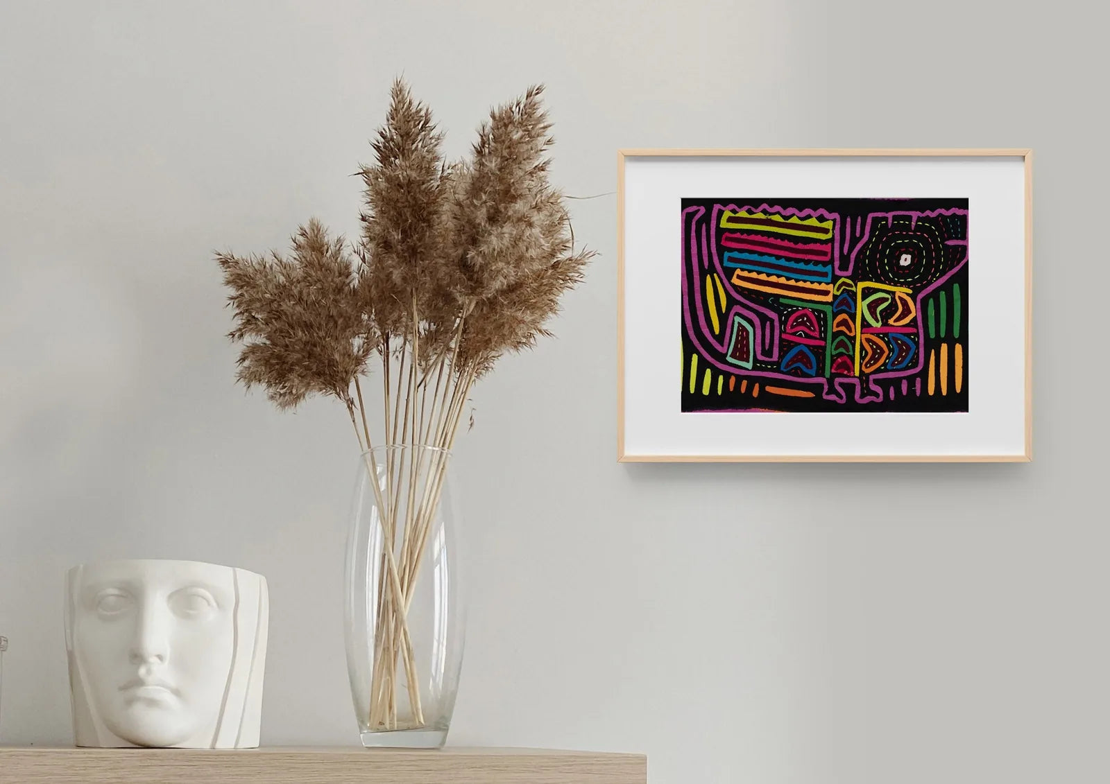 Vintage black and purple Mola tapestry featuring animal shapes and geometric patterns, hand-stitched by Guna artisans.