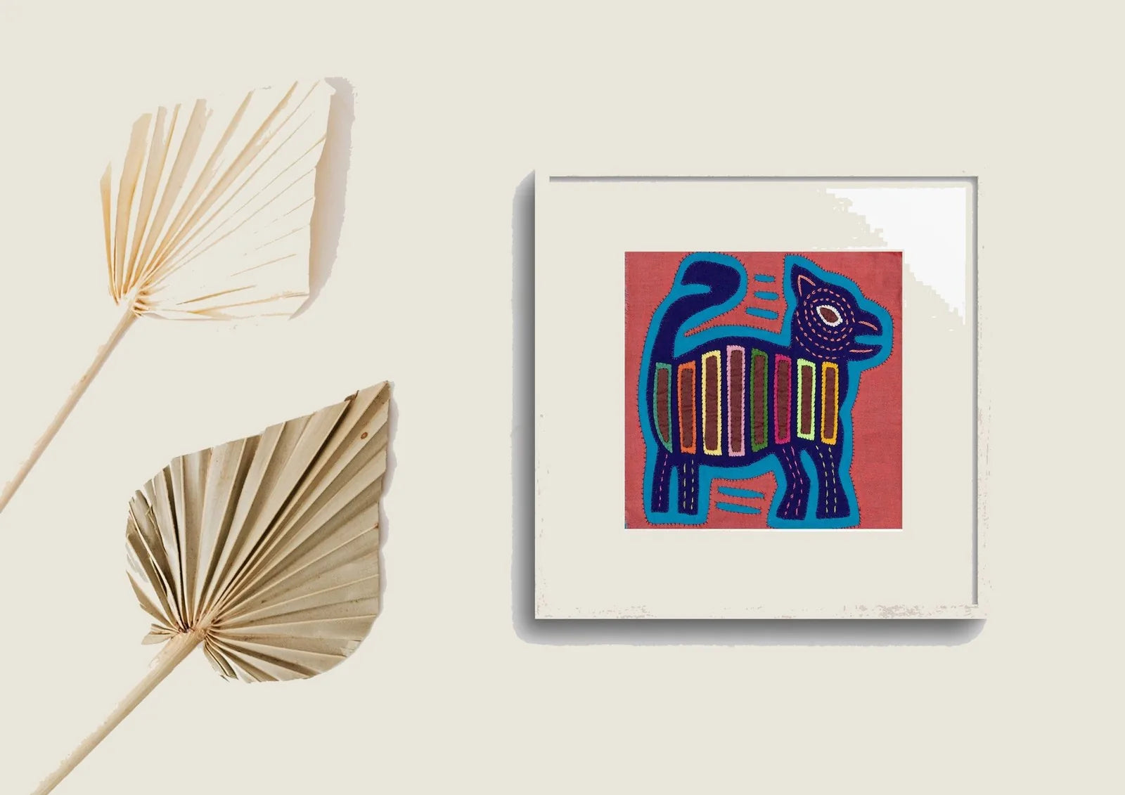 Hand-stitched vintage pink and purple Molita tapestry featuring a playful puppy design and vibrant geometric patterns.