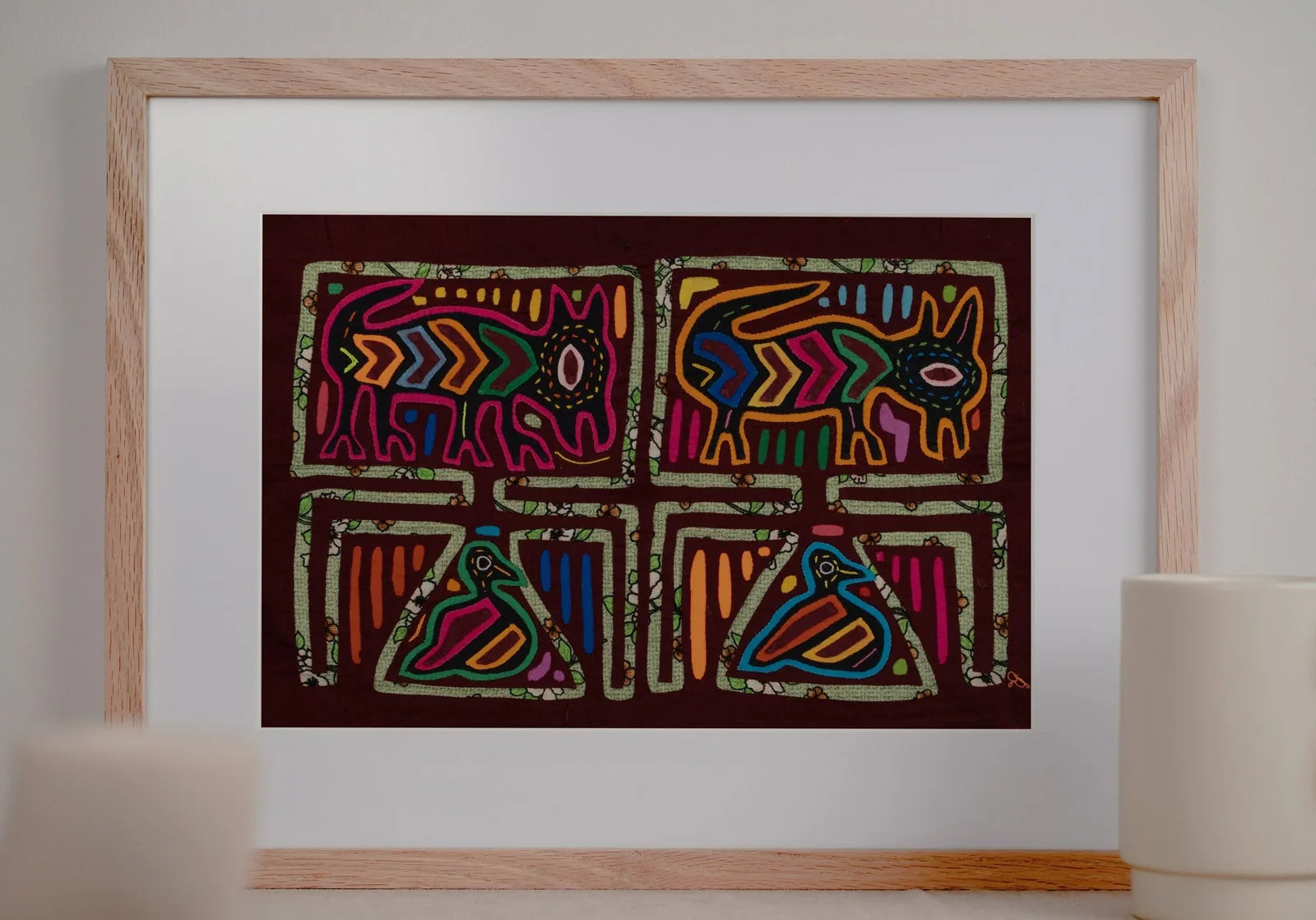 Vintage Mola tapestry featuring a hand-stitched puppy and bird design in vibrant colors and intricate patterns.