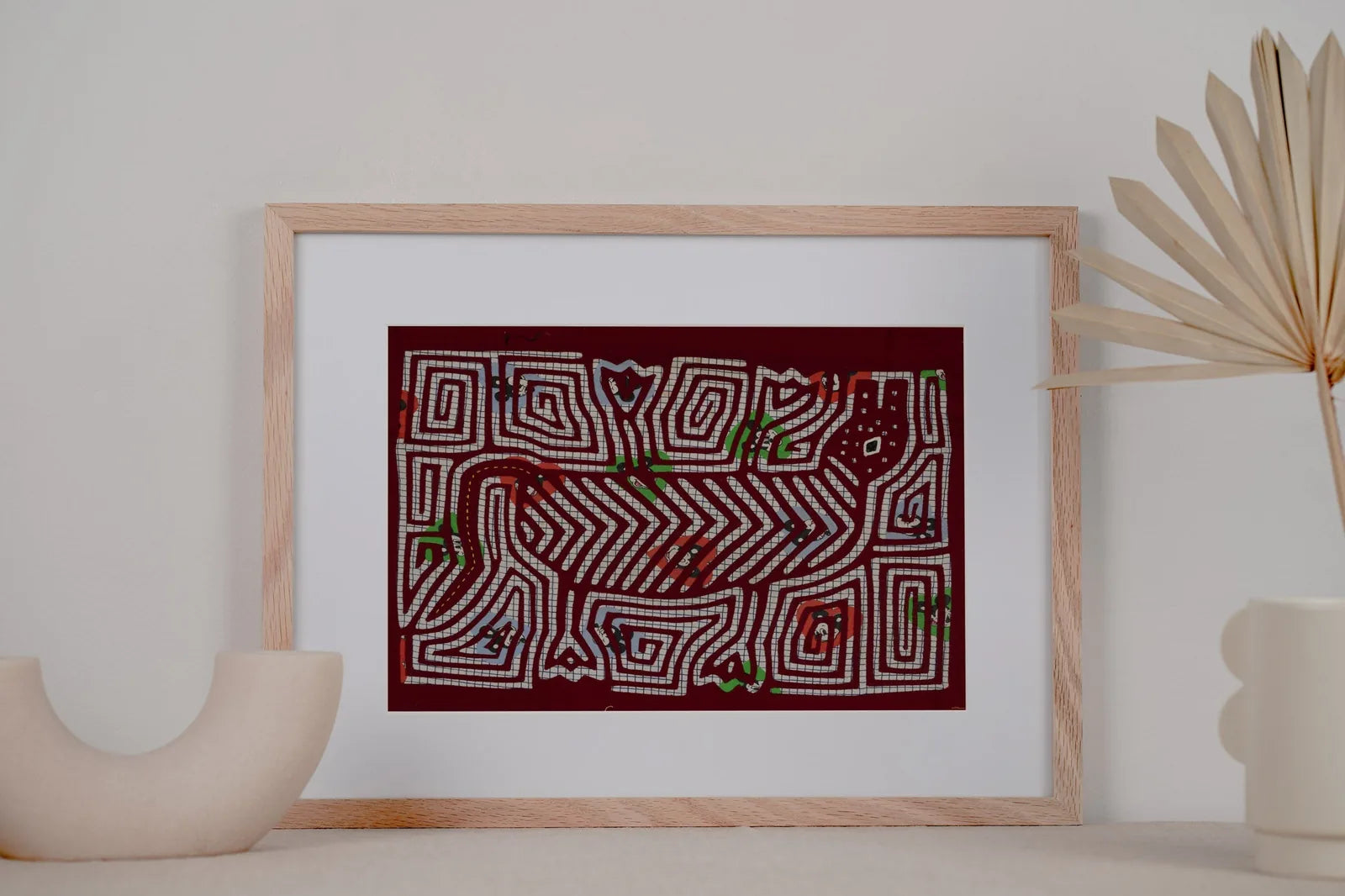 Vintage puppy dog howling design in vibrant colors, framed as decorative textile art, showcasing traditional Mola technique.
