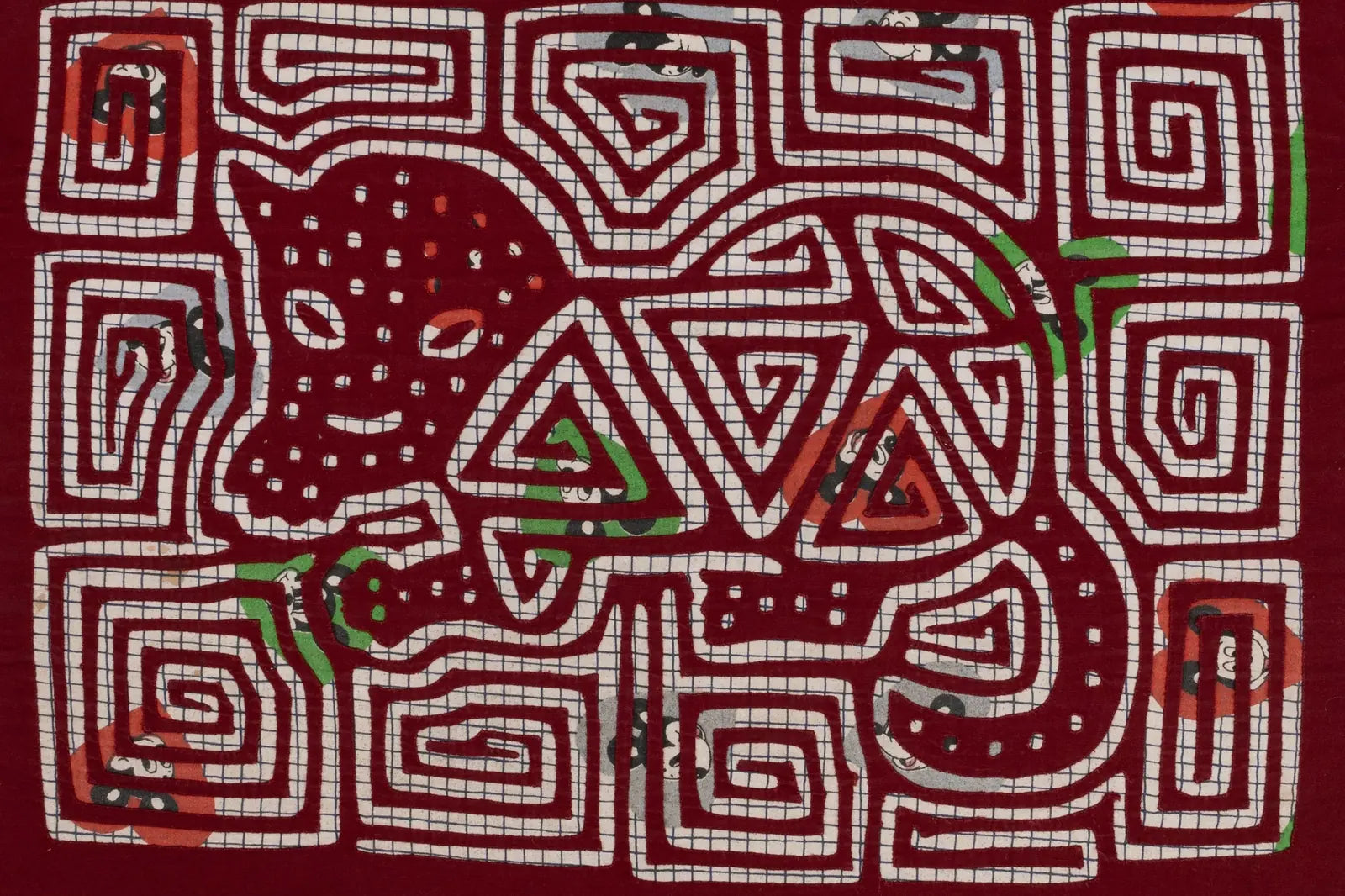 Hand-stitched vintage tapestry featuring a playful dog design in vibrant red, white, and green.