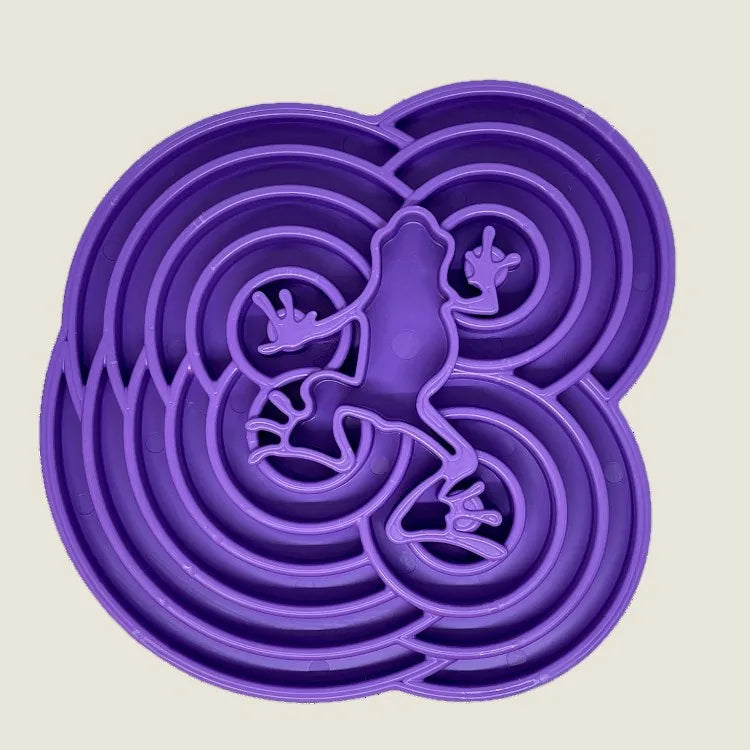 Purple shallow slow feeder dog bowl featuring a textured frog design for mental enrichment and slower eating.