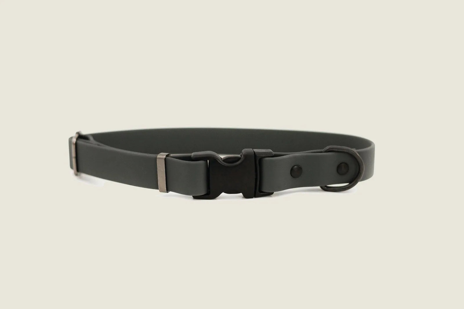 Waterproof charcoal dog collar made of soft PVC, featuring a sturdy YKK buckle and adjustable fit for comfort.