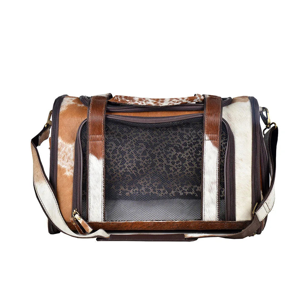 Light-colored Hairon leather dog bag with netted window and stylish straps for comfortable travel with small dogs.