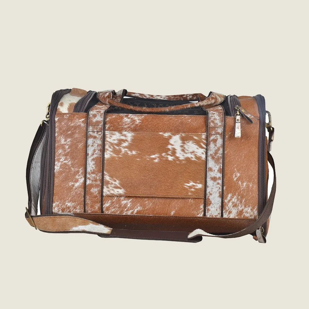 Light brown Hairon leather dog bag with netted window and practical design, ideal for carrying small pets.