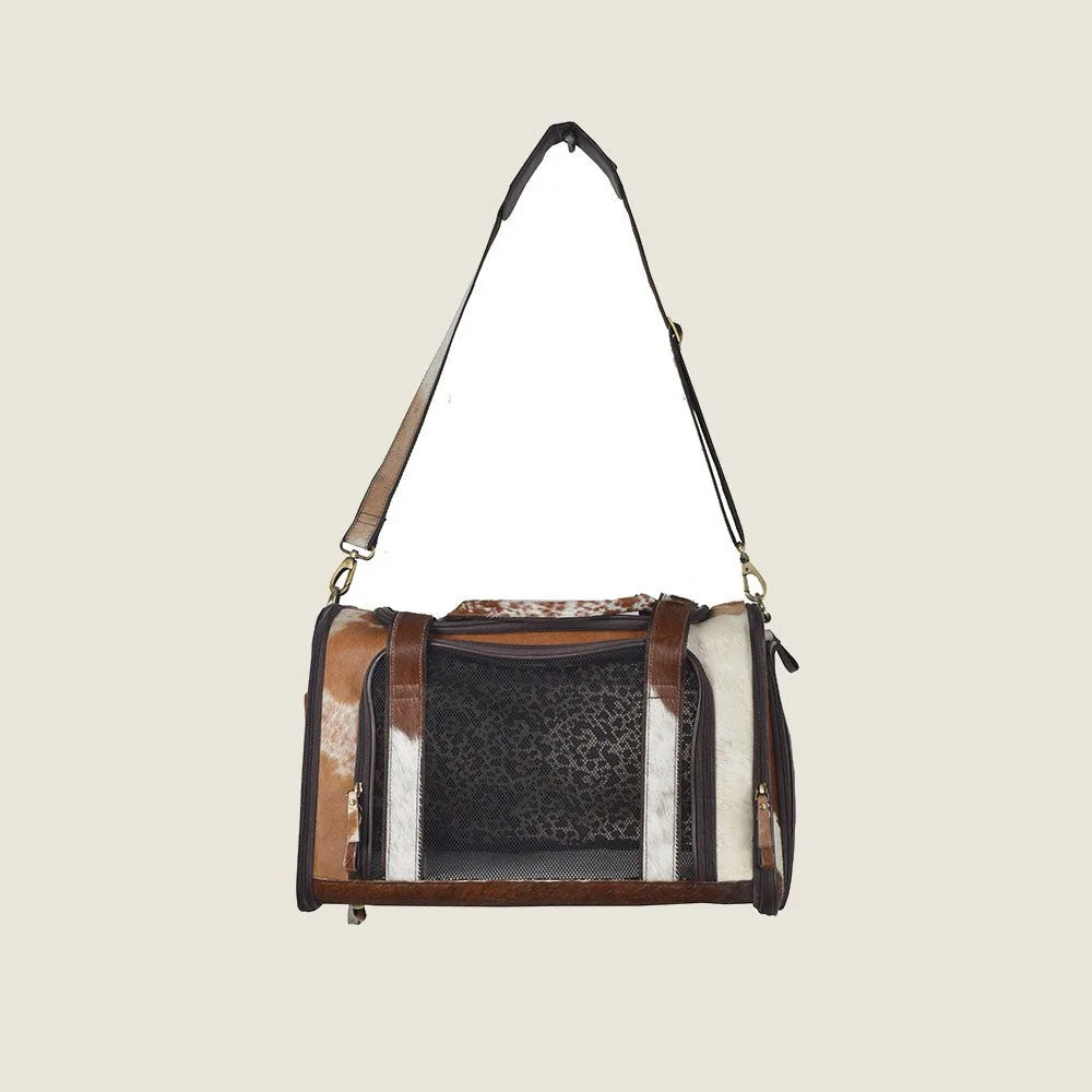 Light-colored Hairon leather dog bag with a netted window and stylish design, perfect for small dog travel.