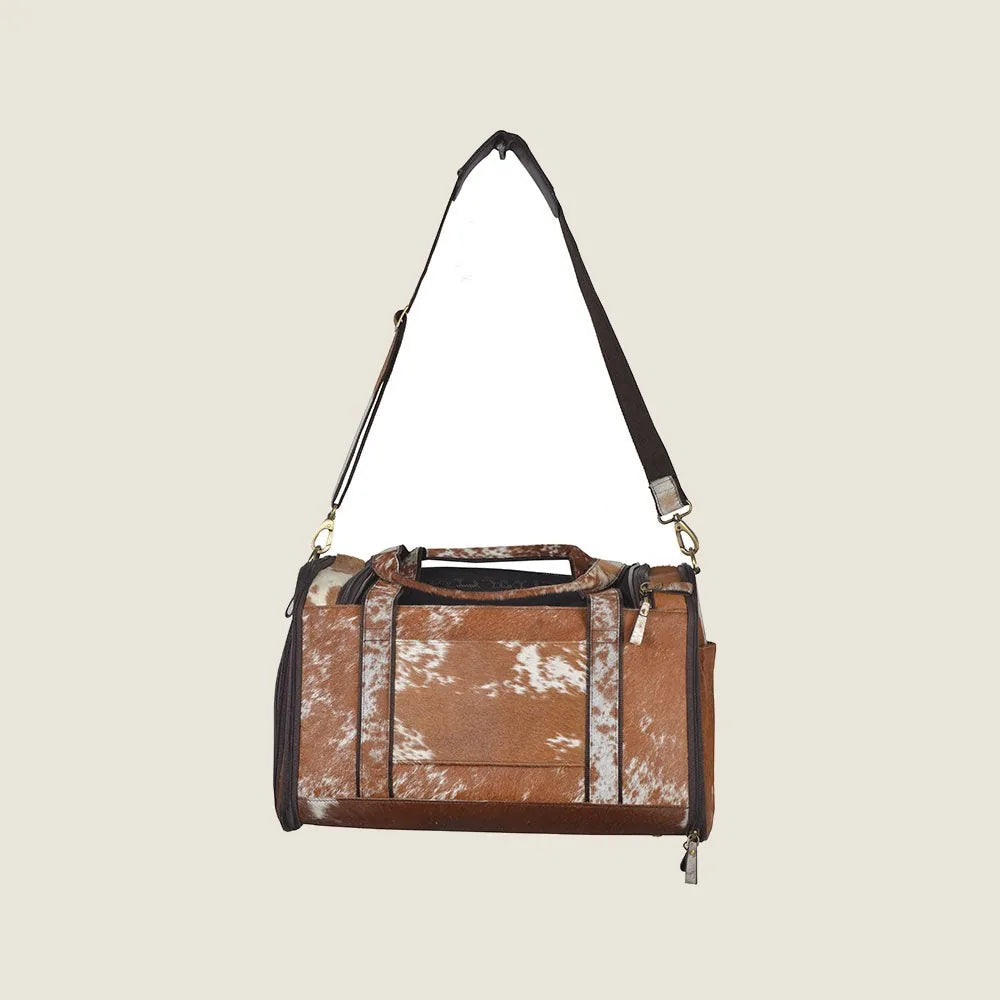 Light brown Hairon leather dog bag with netted window, featuring a shoulder strap and sturdy handles for easy carrying.